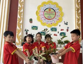 Bé Tiểu học Nam Việt trồng cây hưởng ứng hành động vì môi trường năm 2023